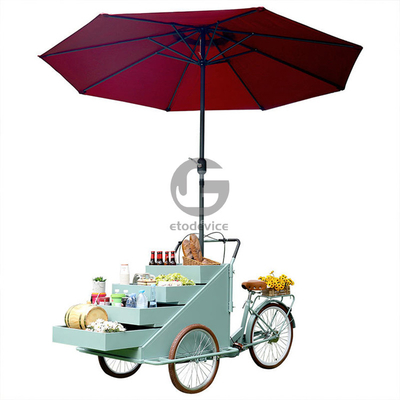 Carrello mobile per il caffè e bicicletta a tre ruote per la consegna della pizza per la vendita all'aperto