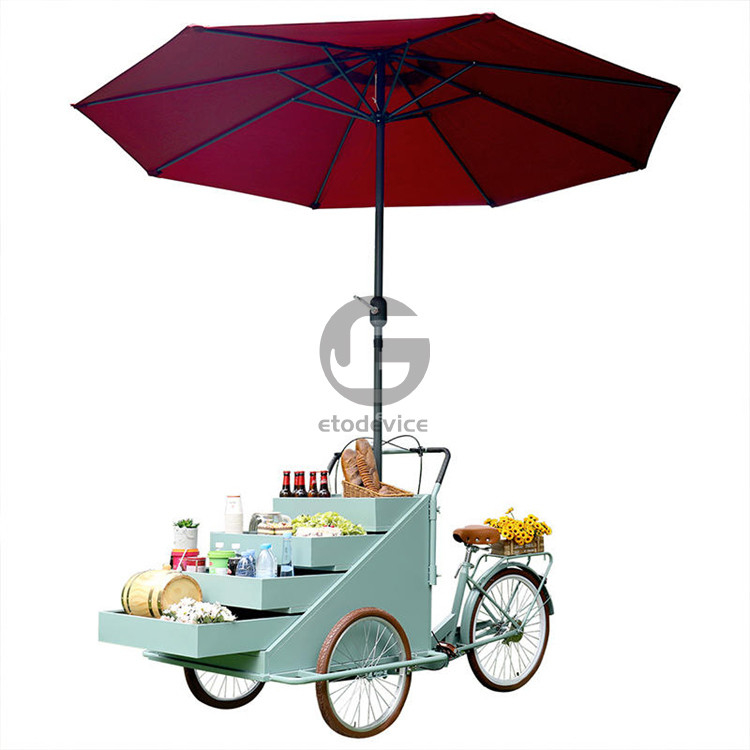 Carrello mobile per il caffè e bicicletta a tre ruote per la consegna della pizza per la vendita all'aperto